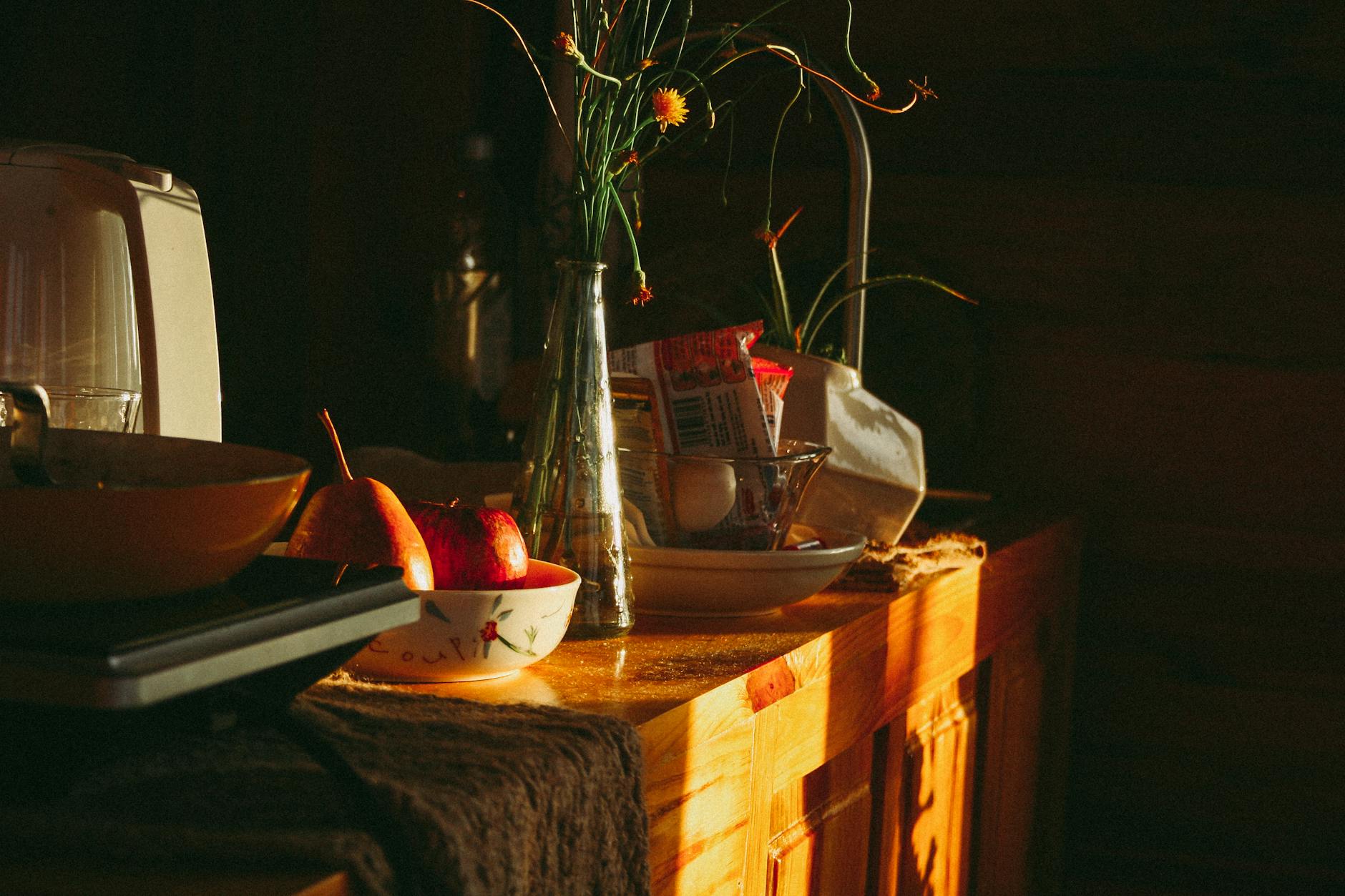 a calm kitchen counter with everyday breakfast items and soft morning light