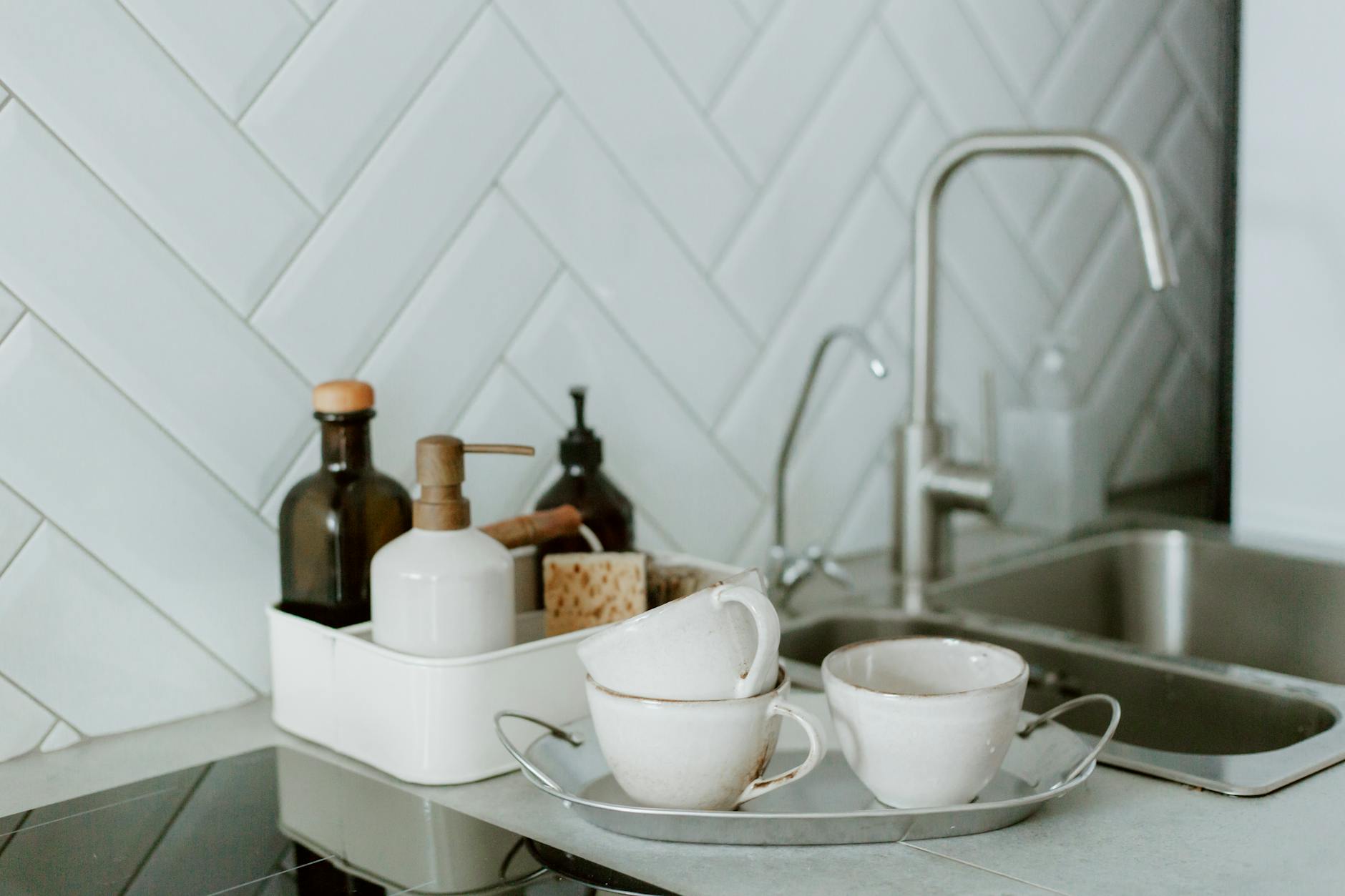 Neat kitchen counter with simple tools and an easy-to-clean sink area
